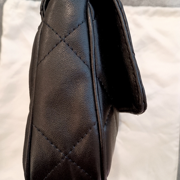 Michael Kors Quilted Black purse Perfect condition. Comes with a dust bag too! - Picture 5 of 7